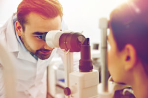 Doctor performing an Eye Exam